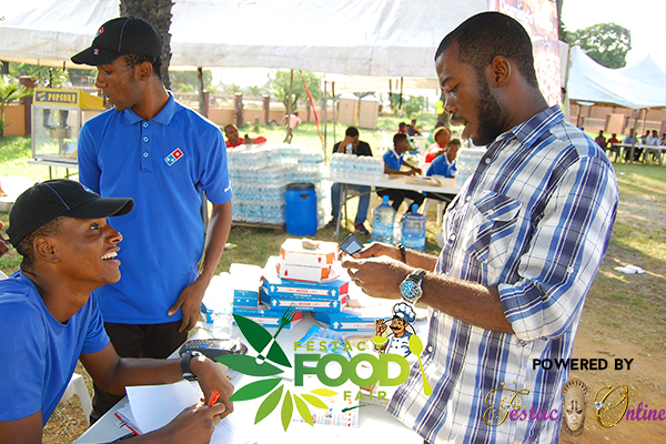 dominos-dishing-out-vouchers-at-festac-food-fair